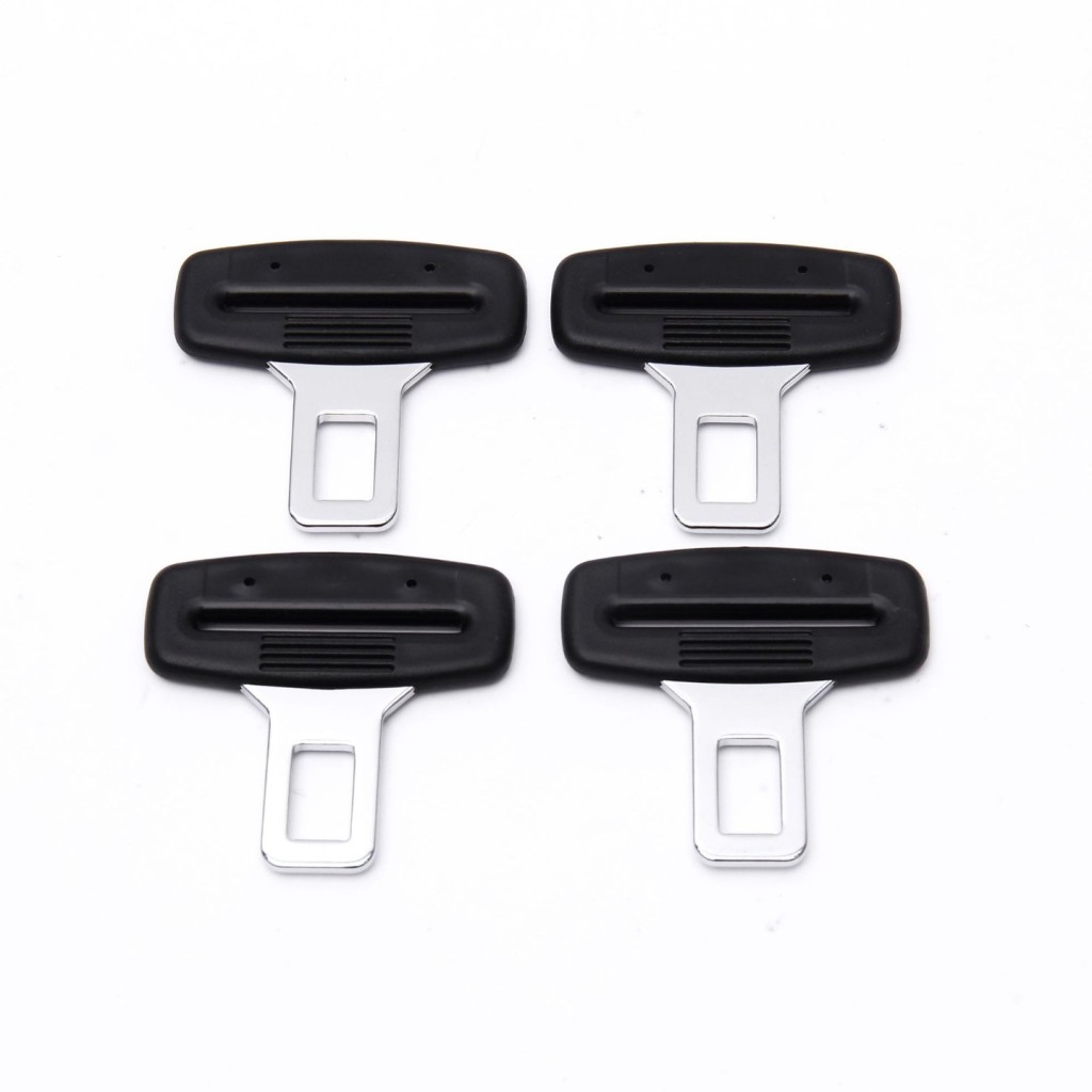 Seat belt parts tongue inserts