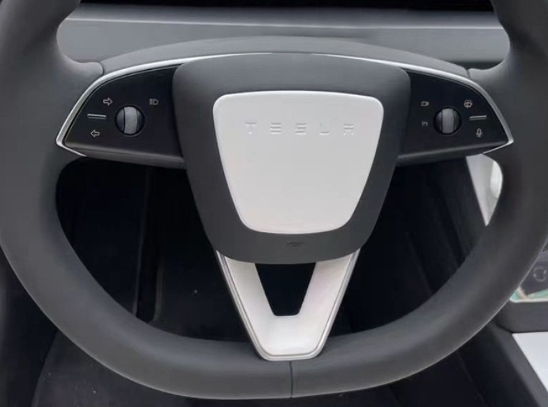 Steering wheel trim with protective stickers