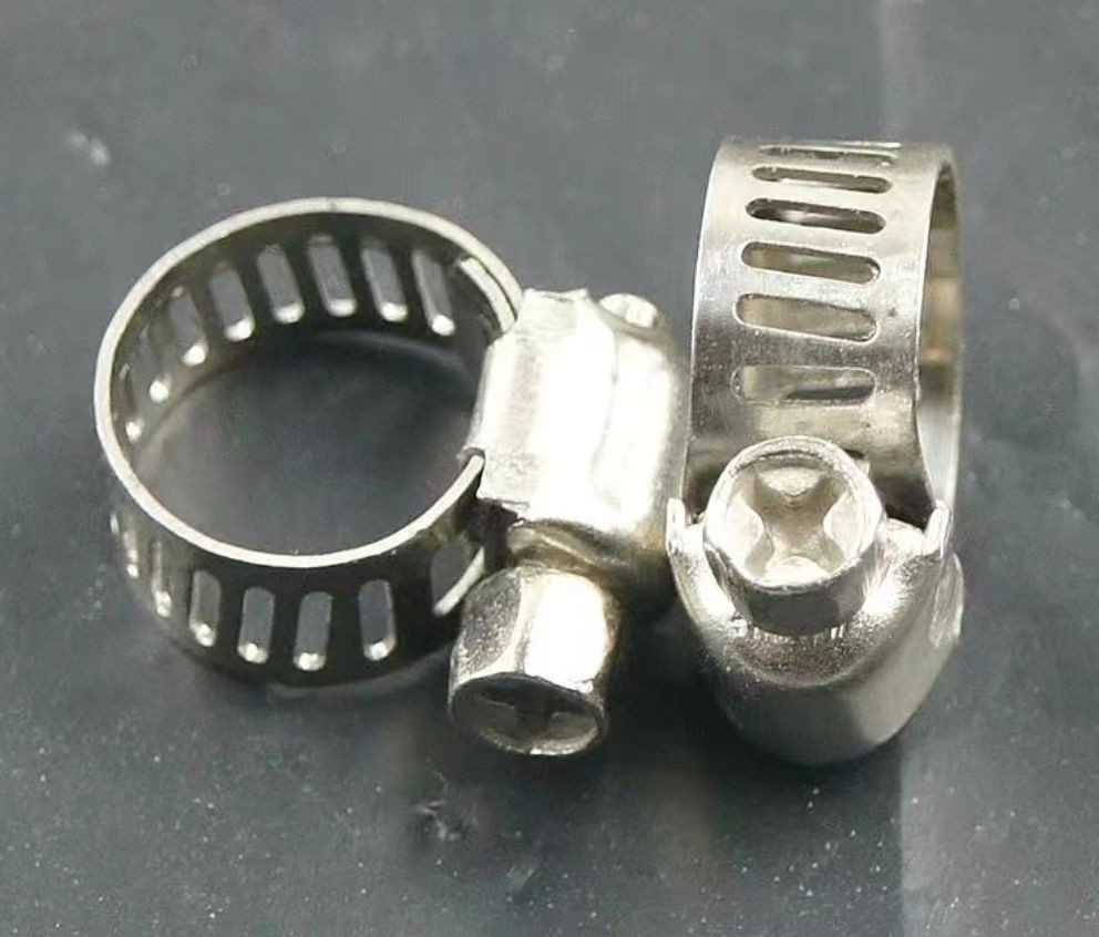 Stainless steel clamps for loaders