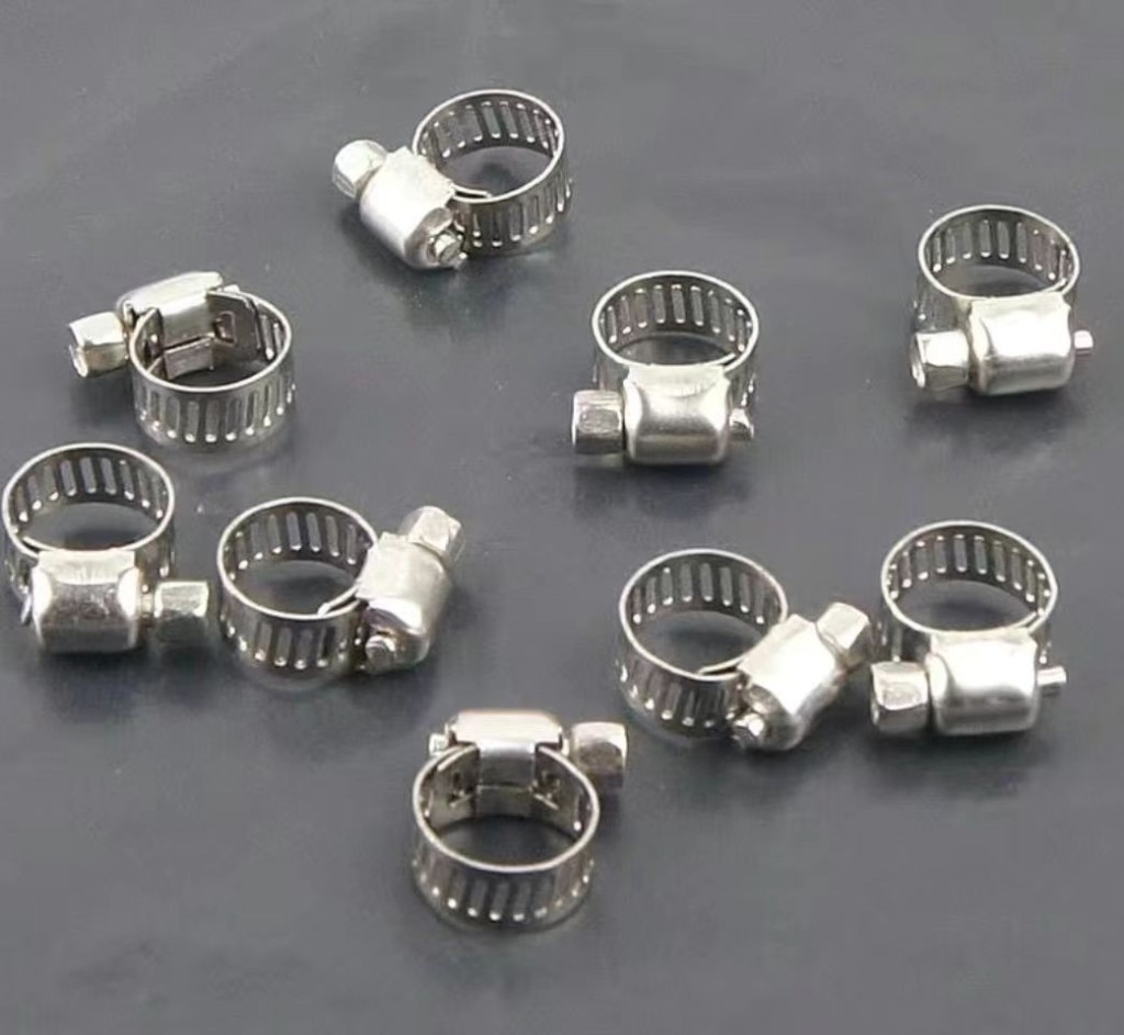 Stainless steel clamps for loaders