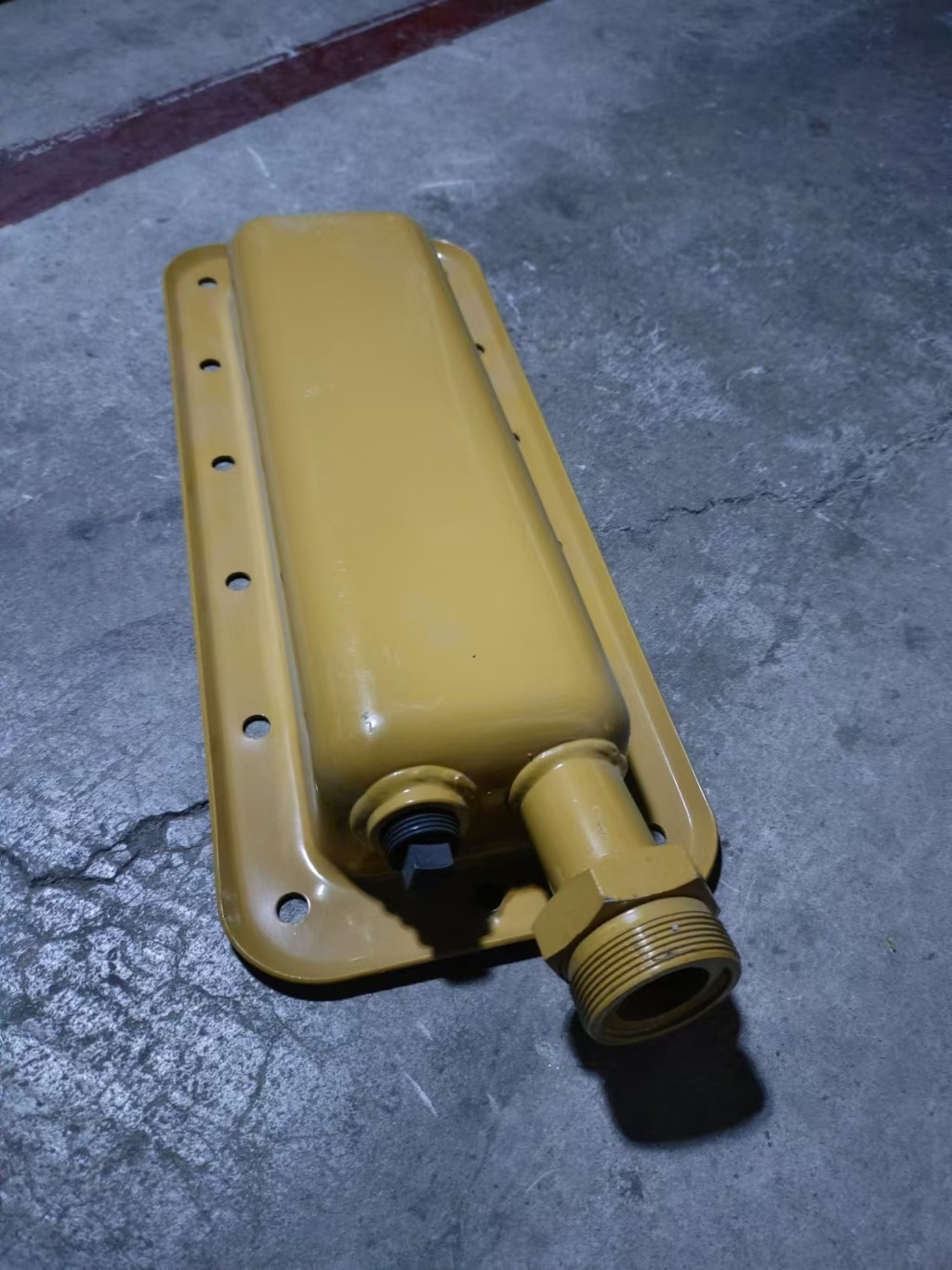 Installed in the oil crankcase neck